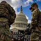 Virginia National Guard soldiers are issued their M4 rifles and live ammunition on the east front of the U.S. Capitol on January 17, 2021.